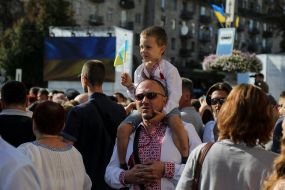 Man and boy in embroidered shirts