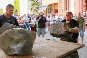 Ivan Grigorovsky raises a stone
