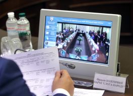 Conciliation board members on the monitor screen