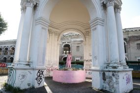 Painted in pink, the Samson fountain on Kontraktova square