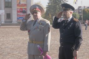 Participants of the flower laying ceremony