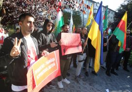 Representatives of the Kurdish Diaspora with posters