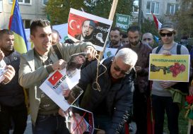 Representatives of the Kurdish Diaspora with posters