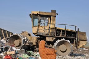 Excavator at the Khmelnitsky solid waste landfill