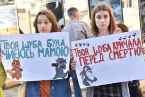 Participants of the action hold posters
