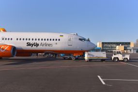 The plane of the Ukrainian Aviacompany SkyUp Airlines at the airport in Zaporozhye