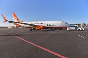 The plane of the Ukrainian Aviacompany SkyUp Airlines at the airport in Zaporozhye