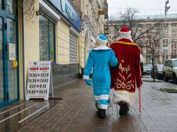 Animators in costumes of Santa Claus and Snihurochka