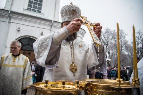 The priest consecrates water