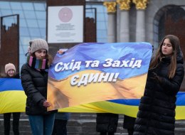 Girl holding a poster