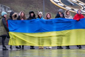 Pupils hold the flag of Ukraine