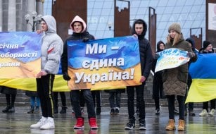 Schoolchildren holding posters