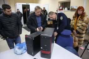 SBU staff conduct a search in one of the offices of 1 + 1 media group