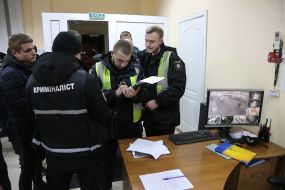 SBU staff conduct a search in one of the offices of 1 + 1 media group
