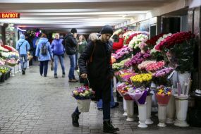 Young man with flowers