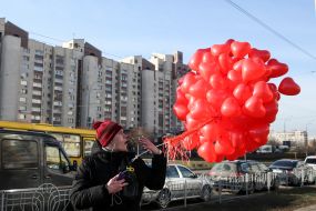 Young man with balloons