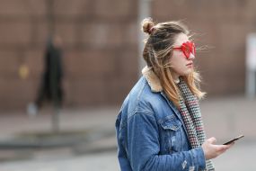 Girl in heart-shaped glasses