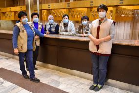 Workers Palace of culture in respiratory masks