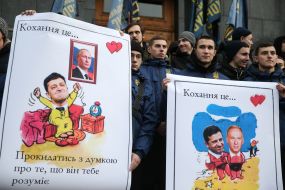The National housing activist holds a placard