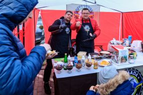 The seller fries pancakes