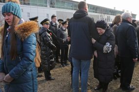 Participants of the ceremony marking the square of memory of victims of the plane crash in the sky of Iran