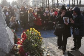 Participants of the ceremony marking the square of memory of victims of the plane crash in the sky of Iran