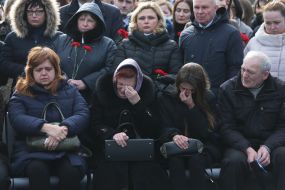Participants of the ceremony marking the square of memory of victims of the plane crash in the sky of Iran