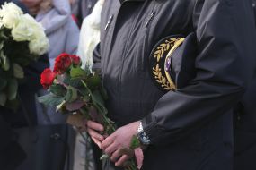 Participants of the ceremony marking the square of memory of victims of the plane crash in the sky of Iran