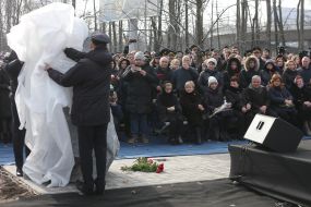 Participants of the ceremony marking the square of memory of victims of the plane crash in the sky of Iran