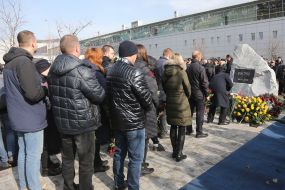 Participants of the ceremony marking the square of memory of victims of the plane crash in the sky of Iran