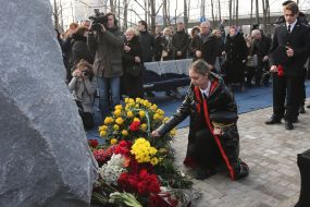 Participants of the ceremony marking the square of memory of victims of the plane crash in the sky of Iran