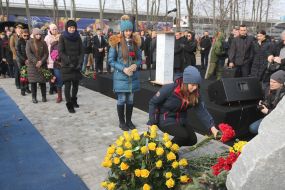 Participants of the ceremony marking the square of memory of victims of the plane crash in the sky of Iran