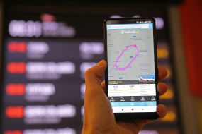 Man holding smartphone in his hand