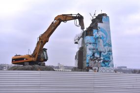 An excavator demolishes the pedestal where stood the statue of Lenin in Zaporozhye