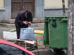 The man near the trash can
