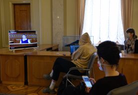 Journalists watching a broadcast of the meeting of the Verkhovna Rada