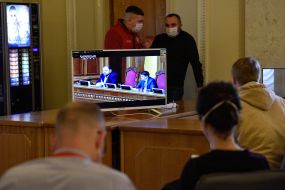 Journalists watching a broadcast of the meeting of the Verkhovna Rada