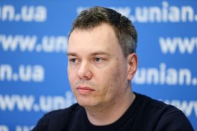 Maksym Tkachenko and  Illarion Karnaukh