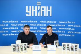 Maksym Tkachenko and  Illarion Karnaukh