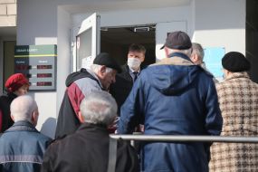 People queuing near the Savings Bank branch
