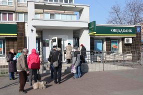 People queuing near the Savings Bank branch