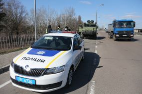 The checkpoint police in conjunction with the national guard at the entrance to Kiev