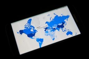 Mark "Ukraine 218 patients on coronavirus" on the distribution map coronavirus infection COVID-19 in the world