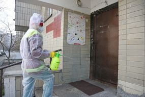 Disinfection entrance of a residential building in Kiev
