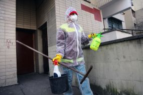 Disinfection entrance of a residential building in Kiev