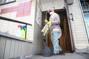 Disinfection entrance of a residential building in Kiev
