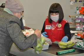 The buyer pays at the cash desk