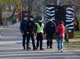 Police and municipal guard patrol the streets