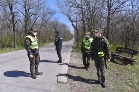 The law enforcement officers together with servicemen of the national guard patrolling the entrance to the island Khortytsya