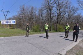 The law enforcement officers together with servicemen of the national guard patrolling the entrance to the island Khortytsya